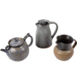 Three stoneware studio items, to include a teapot and two jugs.