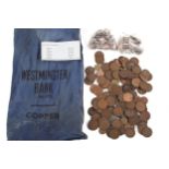 An old Westminster Bank bag with 20th century pennies and half pennies