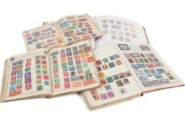 A collection of stamps in four albums.