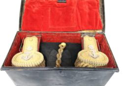 Military : WWI Royal Navy officers bicorn hat and epaulets in fitted black Japanned box.