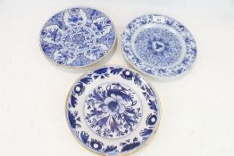 Three Dutch Delft plates.