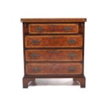 A 20th century George I style figured walnut bachelor's chest.