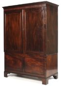 A Georgian (and later) mahogany linen press.