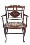 A late Victorian Black Walnut inlaid chair.