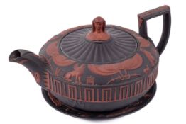 A Wedgwood basalt path de terre Egyptian revival teapot and stand.