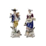 Chelsea porcelain : A pair of gold anchor mark hand painted ceramic figures on Rococo bases.