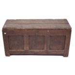 An early 18th oak three panel coffer of smaller proportions (perhaps a sword chest).