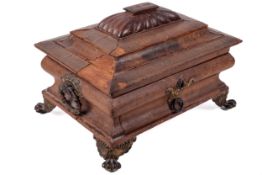 A Regency sewing box of sarcophogal form.