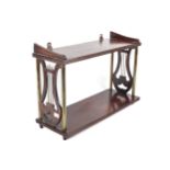 A 19th century Regency mahogany and brass lyre-ended set of wall hanging shelves. 35.5 cm H x 52.