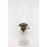 A 19th century cut glass pedestal oil lamp.