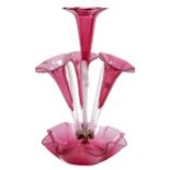 A Victorian cranberry glass table centrepiece Epergne.