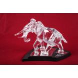 A Swarovski crystal glass elephant in fitted case, documents, etc.