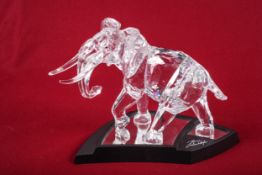 A Swarovski crystal glass elephant in fitted case, documents, etc.