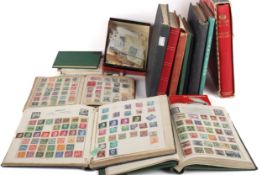 A world collection of stamps in several albums and a few reference booklets.