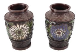 A pair of Chinese champleve bronze short baluster vases with flower decoration, 11.