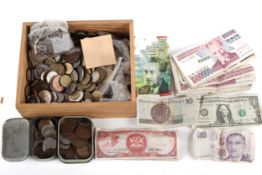A collection of assorted coins and bank notes.