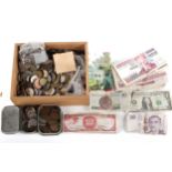 A collection of assorted coins and bank notes.