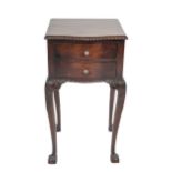 An 18th century Chippendale influenced serpentine mahogany cabinet.