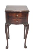 An 18th century Chippendale influenced serpentine mahogany cabinet.