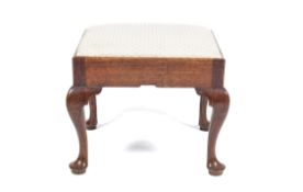 A George II oak pad foot drop-in over stuffed stool. 43.