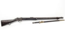 A Martini Henry Mk 4 1871-87. A rifle with good bore, 45/577, complete with bayonet and scabbard.