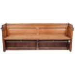 A 19th century Glastonbury double panel pine pew.