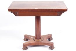 A Victorian mahogany pedestal fold over tea table.