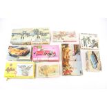 A collection of assorted vintage Airfix and other model vehicle kits.