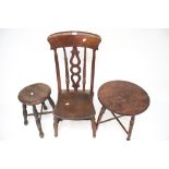 A vintage wooden stool, circular table and a chair.