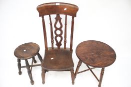 A vintage wooden stool, circular table and a chair.