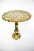 A contemporary circular stone side table possibly marble.