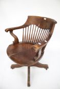 An early 20th century mahogany desk chair.