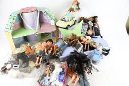 A collection of Bratz dolls and accessories. Including a car, 'Loungin' Loft', clothing, etc.
