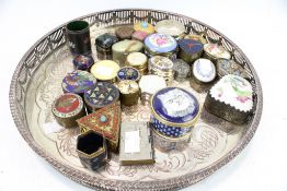A collection of trinket boxes and a circular silver plated tray.