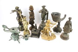 Collection of ten assorted figures. Including two oil lamps and a horn vase, etc. Max.