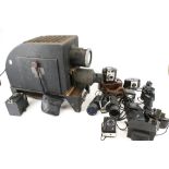 A collection of assorted vintage camera equipment.