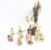 Eight porcelain bird figurines. Including seven Royal Worcester models, and an eagle. Max.