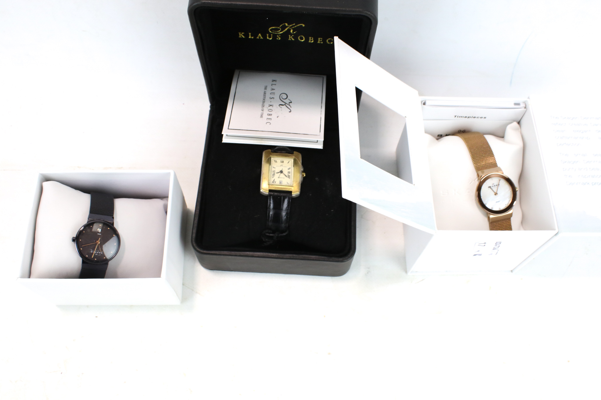 Three lady's wrist watches.