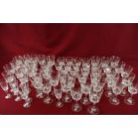 A large collection of assorted wine drinking glasses.