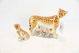 Two Royal Crown Derby animal figures.