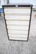 A vintage metal filing cabinet. Seven drawers, H94.5cm x W56.5cm x D63.
