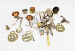 A small quantity of assorted plated and brass items. Including flatware, a lighter, horse brass etc.