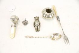 An assortment of silver collectables.