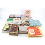 A collection of vintage wooden jigsaw puzzles.