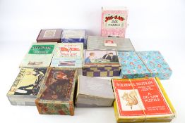 A collection of vintage wooden jigsaw puzzles.