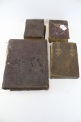 Four Victorian and later leather bound photograph albums.