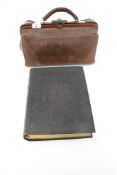 A vintage brown leather Doctor's bag plus a large leather bound Bible.
