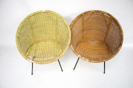 Two Mid century wicker satellite style chair on metal base.