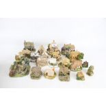 Twenty one Lilliput Lane model cottages.