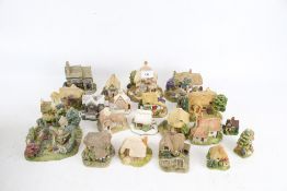 Twenty one Lilliput Lane model cottages.